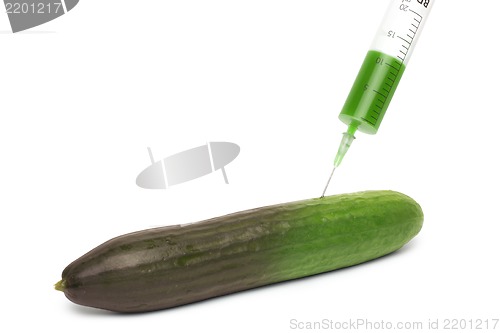 Image of cucumber and syringe - concept