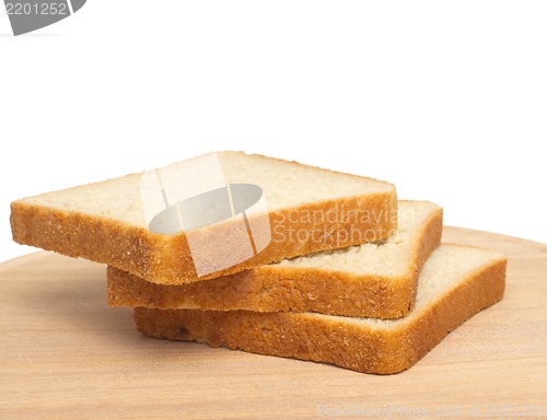 Image of Slices of bread on white background