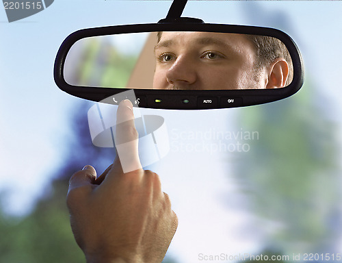 Image of rear-view mirror in a car