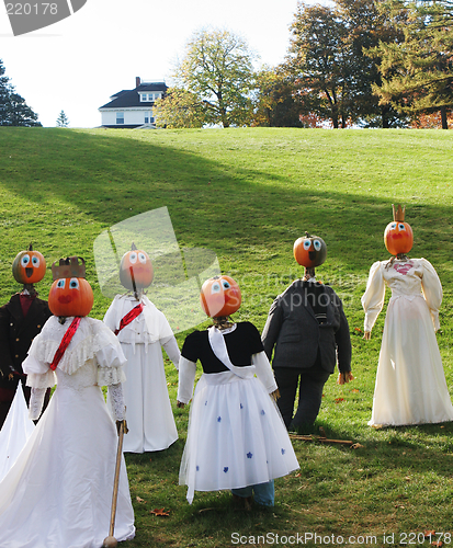 Image of Pumpkin people gathering.