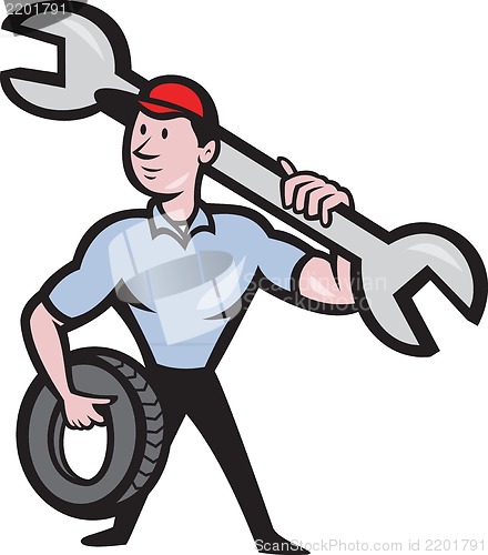 Image of Mechanic With Tire Socket Wrench And Tire