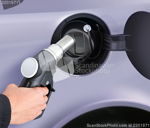 Image of putting gas into the car