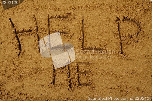 Image of help me in the sand