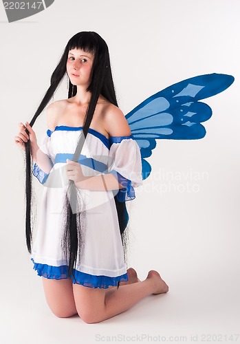 Image of Attractive girl as fairy with wings