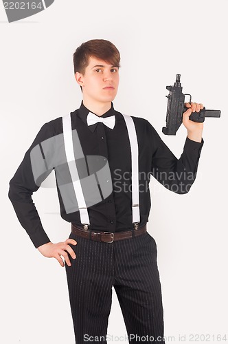 Image of Young gangster with a gun