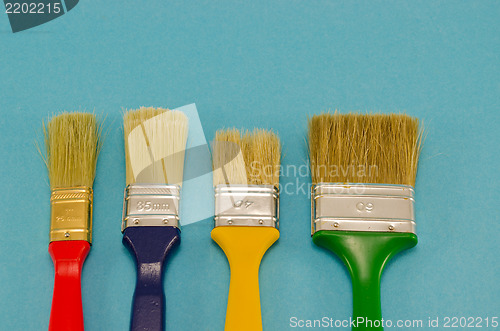 Image of paint brush tool color size on blue 