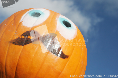 Image of Orange pumpkin face.