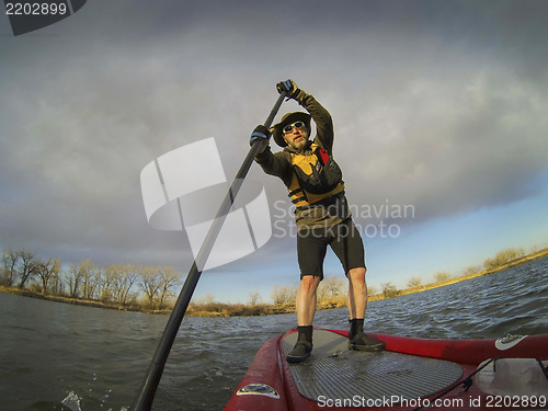 Image of paddling stand up board