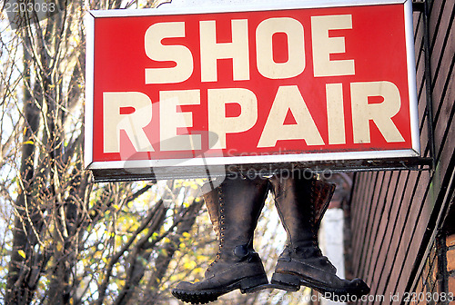 Image of Shoe repair sign.