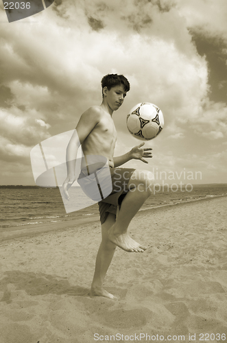 Image of summer soccer on the beach