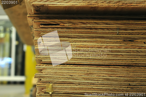 Image of edge of stack of plywood