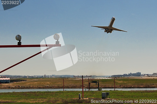 Image of jet approaching airport