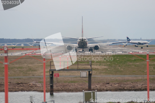 Image of airplane flying to airport washington dc