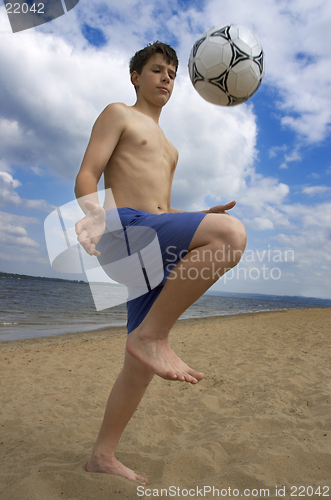 Image of summer soccer on the beach