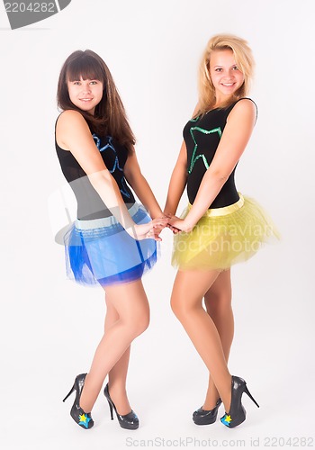 Image of Two pretty girls dancing