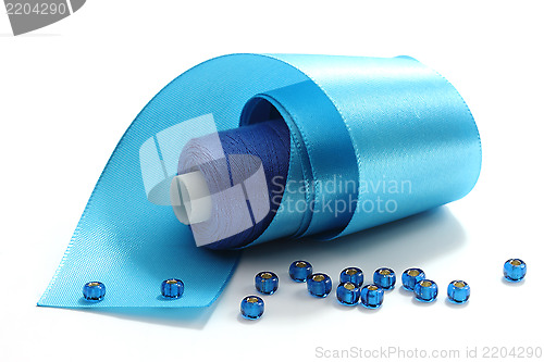 Image of Blue tape and blue threads