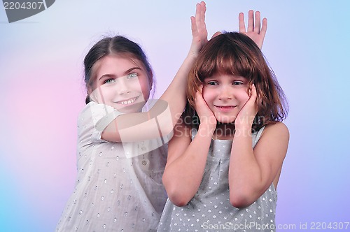 Image of happy laughing girls talking and having fun