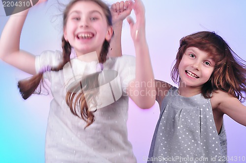 Image of children having fun and dancing