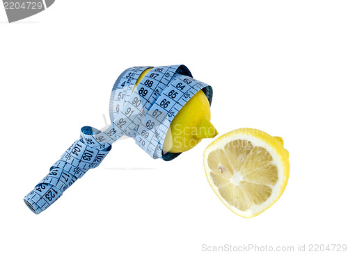 Image of lemon rotated with blue centimeter and piece lemon 