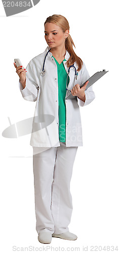 Image of Yound Woman Doctor Reading a Phone Message