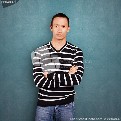 Image of Asian Man In Striped Pullover