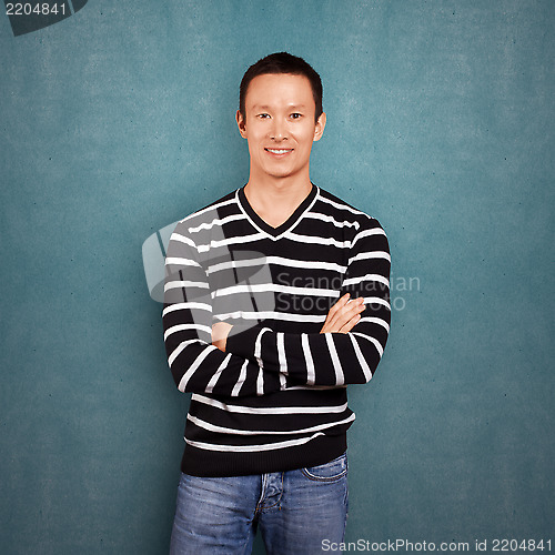 Image of Asian Man In Striped Pullover