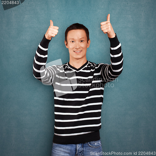 Image of Asian Man In Striped Pullover