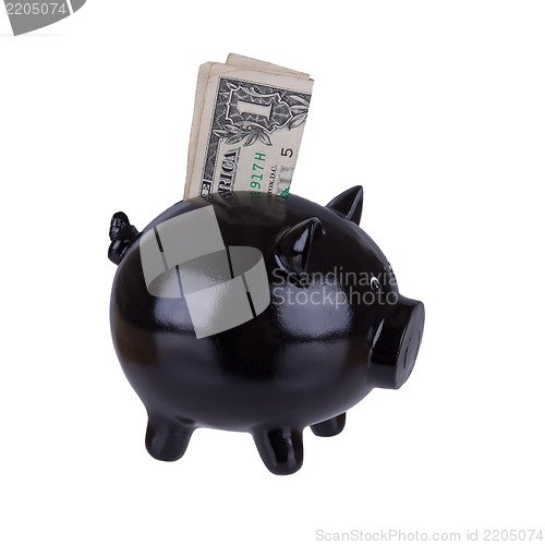 Image of Piggy bank with one dollar bill