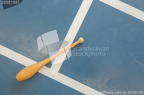 Image of Wooden pin on a court