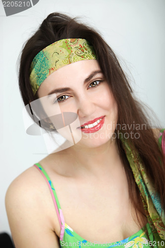 Image of Beautiful woman in green summer outfit