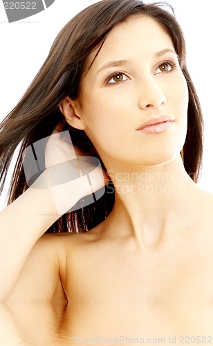 Image of lovely brunette looking up in water