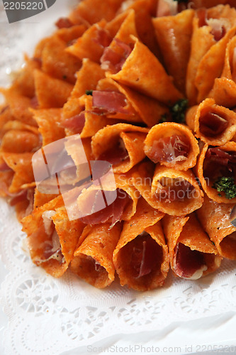 Image of Close up of a plate of brandy snap cones