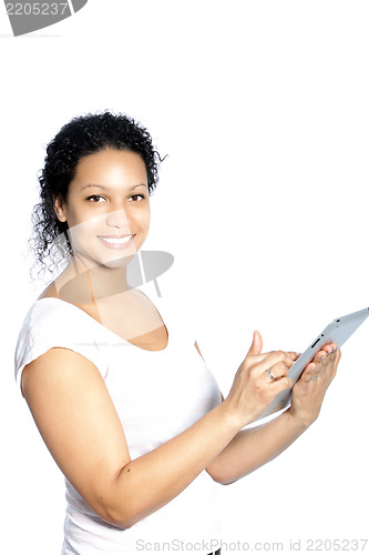 Image of Beautiful woman scrolling on her tablet