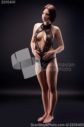 Image of young woman in black lingerie