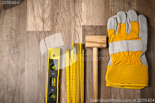 Image of Working tools on a board, a close up