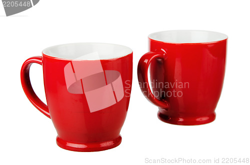 Image of Two red ceramic mug, isolated on white