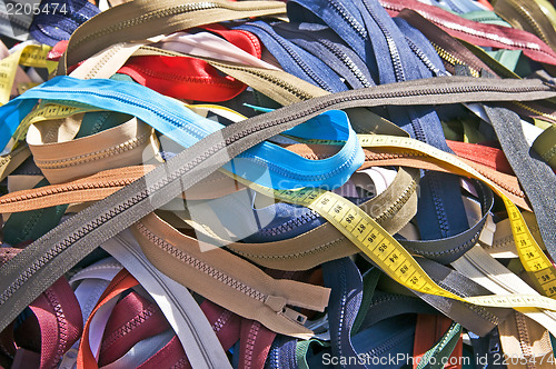 Image of Zippers on a market