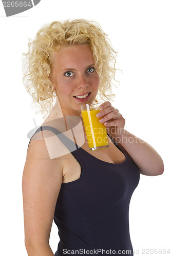 Image of Young woman with glass orange juice 