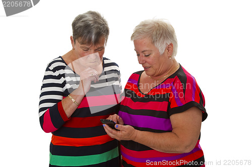 Image of Two female senior with cellphone