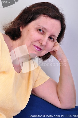 Image of smiling naturl looking senior woman 