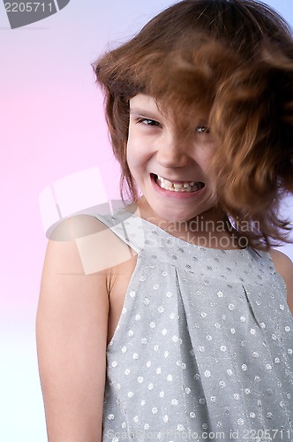 Image of  pretty 8 year old girl in silver dress