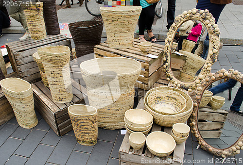 Image of ceramic vases bowls fair mirrors ornamented frames 