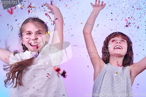 Image of two girls having fun and dancing