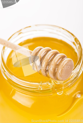 Image of Honey in bank isolated by the white