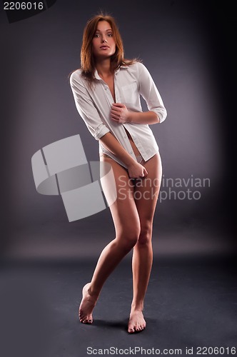 Image of young sexy woman in white shirt