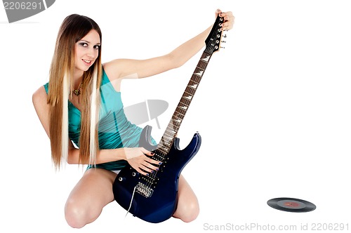 Image of Pretty girl with electric guitar