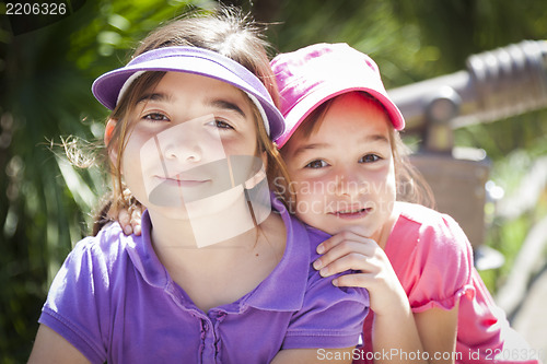 Image of Pretty Young Sisters Portrait Outside