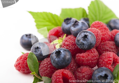 Image of Many blueberries & raspberries.