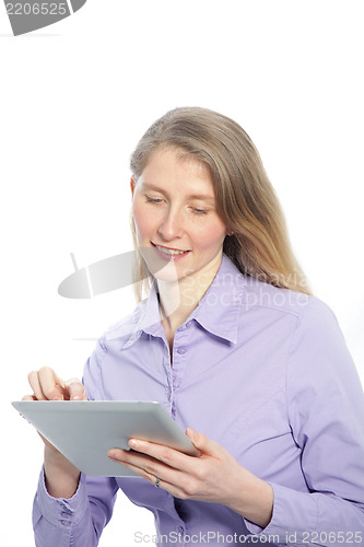 Image of Middle-aged woman using a tablet