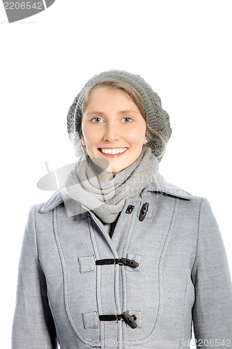 Image of Smiling woman in a winter ensemble
